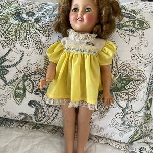 Original circa 1950 Shirley Temple doll with yellow dress